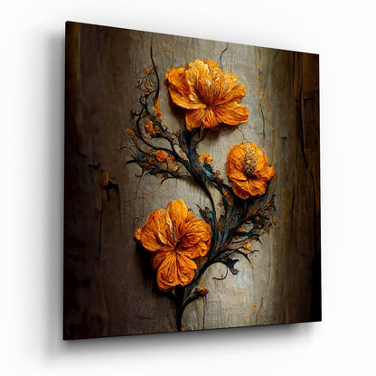 Three vibrant orange flowers on a dark twisted branch against a weathered gray wooden background, displayed as glass wall art.