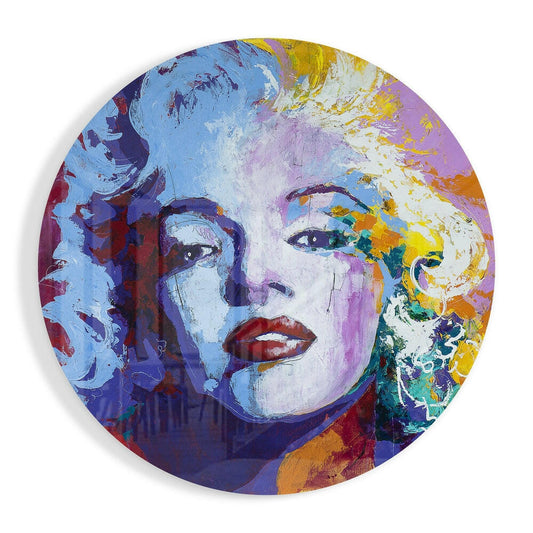 Circular glass wall art featuring a colorful portrait with blue, purple, yellow, and red paint splashes on white background.