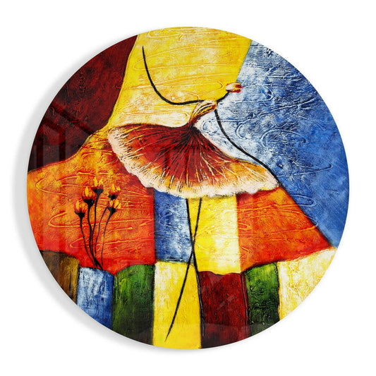 Circular glass wall art featuring a stylized ballerina in a red and white tutu against a colorful geometric background of primary colors.