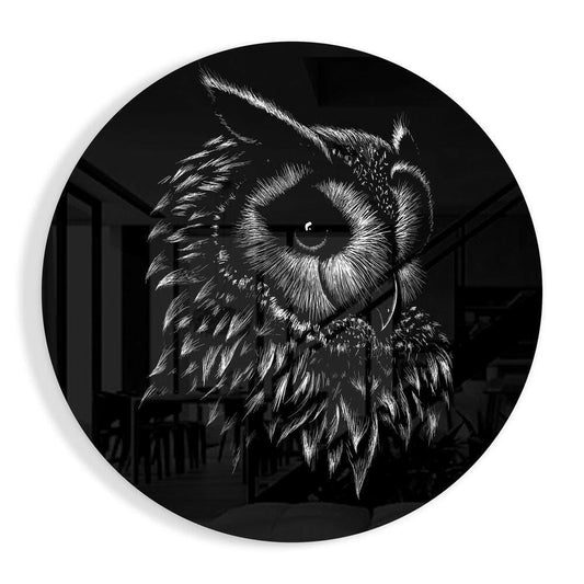 Detailed black and white sketch of an owl's head on circular glass, displayed against an interior room background.