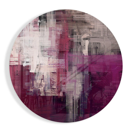 Circular glass wall art with magenta, pink, and cream woven crosshatch pattern, front view against white background.