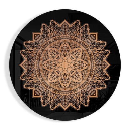 Circular black glass wall art featuring an intricate copper-colored mandala flower pattern with concentric layered petals radiating from center.
