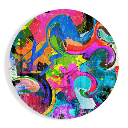 Vibrant circular glass wall art featuring overlapping swirling forms in magenta, blue, cyan, lime green, orange, and black with splattered paint effects.
