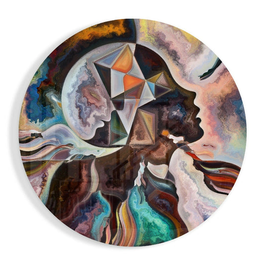 Circular glass wall art featuring two profile faces with geometric triangle patterns inside, surrounded by swirling marbled colors in blues, greens, oranges, and purples.