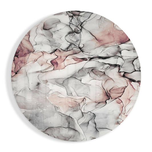 Circular glass wall art with swirled watercolor patterns in soft blush, gray, and white tones with black ink line details.