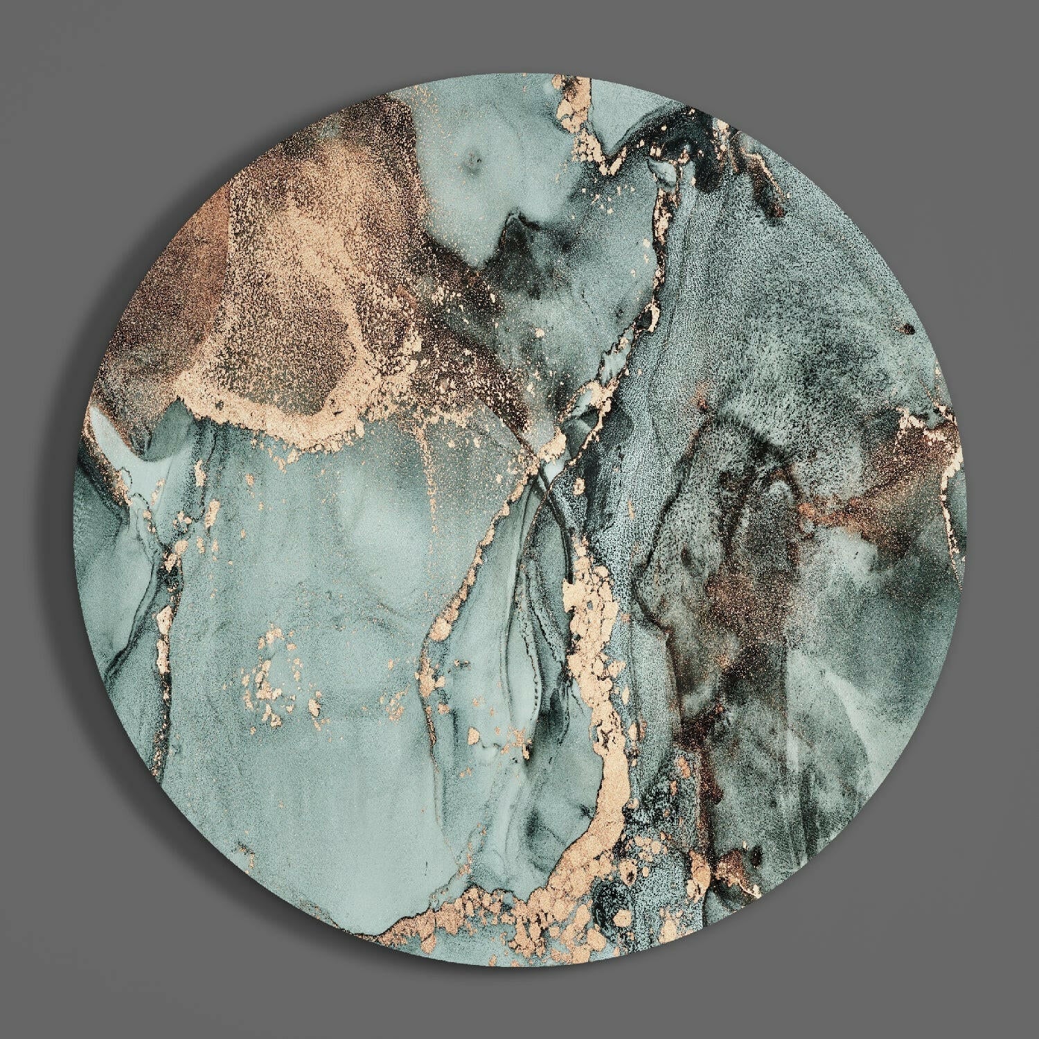 Circular turquoise marble glass wall art with tan and brown veining and metallic gold accents throughout, flat lay view against gray background.