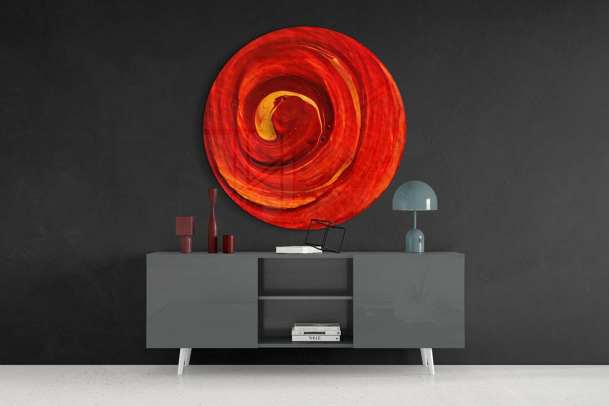 Red Cycle Glass Wall Art displayed above a gray sideboard with decorative objects, showing concentric circular design in red, orange, and yellow tones.