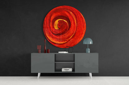 Red Cycle Glass Wall Art displayed above a gray sideboard with decorative objects, showing concentric circular design in red, orange, and yellow tones.