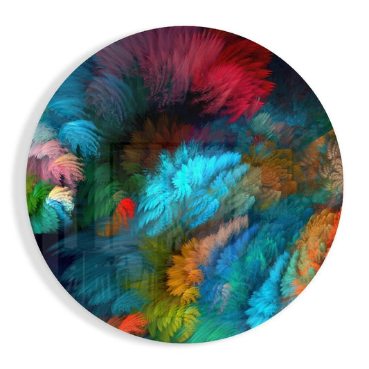 Circular glass wall art featuring layered feather textures in vibrant blues, teals, reds, oranges, yellows, and purples with soft shadow effect.