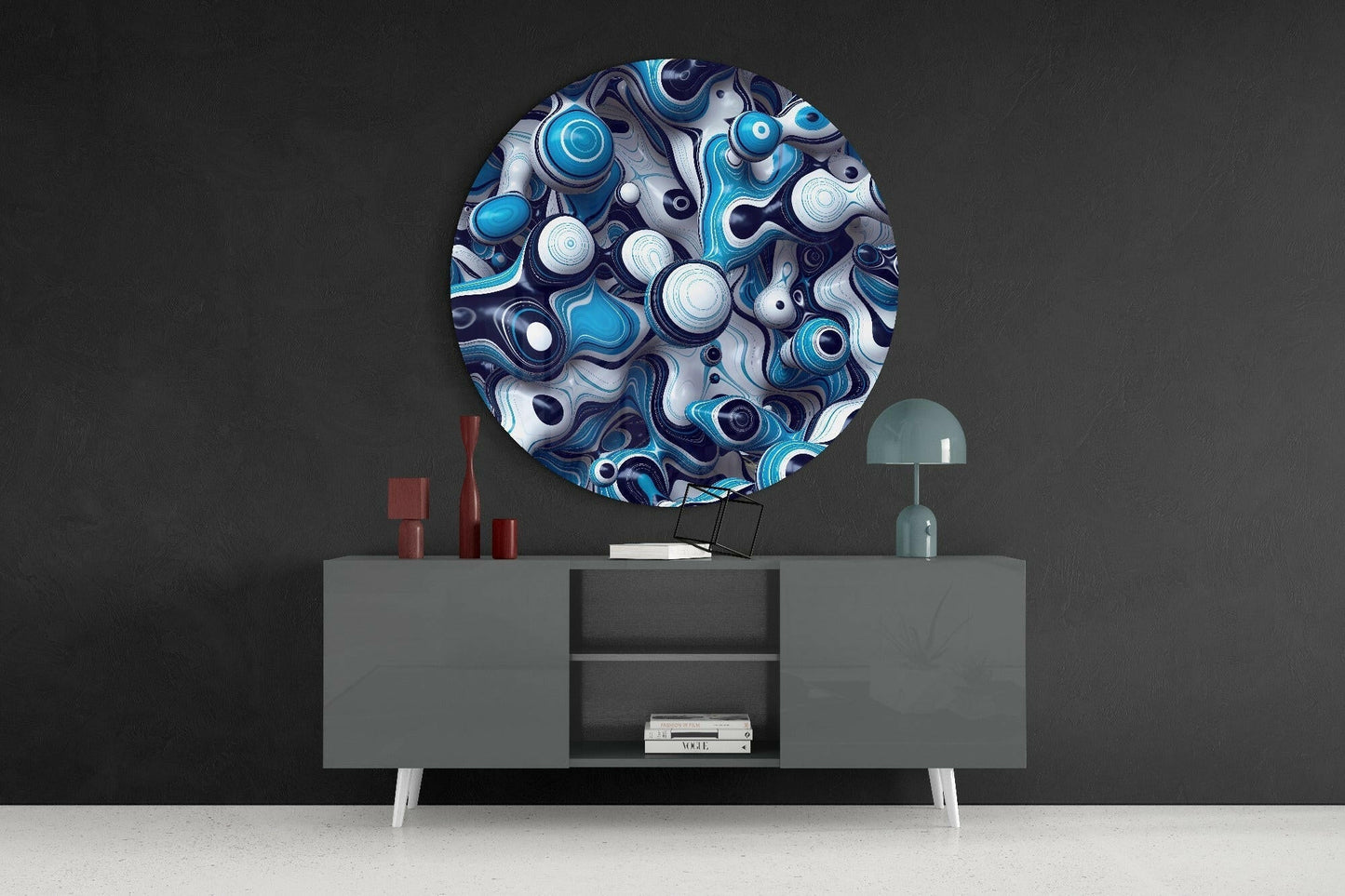 Round blue and white glass wall art with swirled patterns displayed above gray media console in modern interior setting.