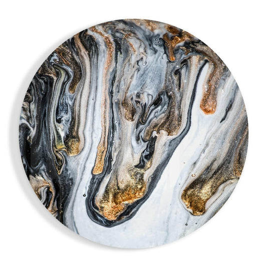 Circular glass wall art with swirled black, white, and gold marble pattern, photographed flat against white background.