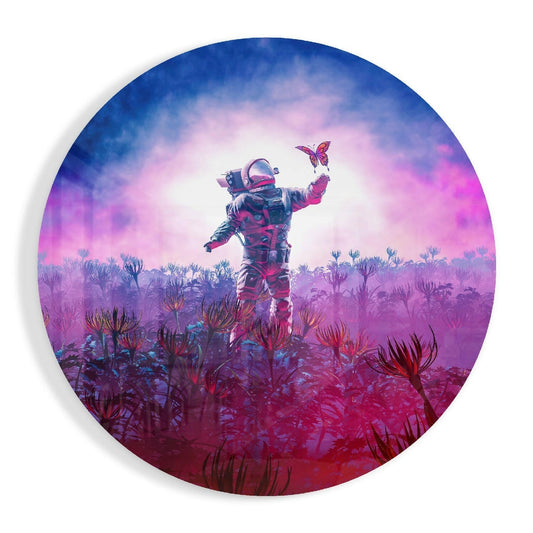 Astronaut in spacesuit holding butterfly aloft in vibrant magenta and pink alien flower field under blue sky, circular glass art.