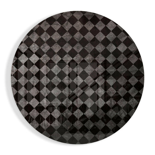 Circular glass wall art with a charcoal gray and black diamond checker pattern, viewed straight-on against a white background.
