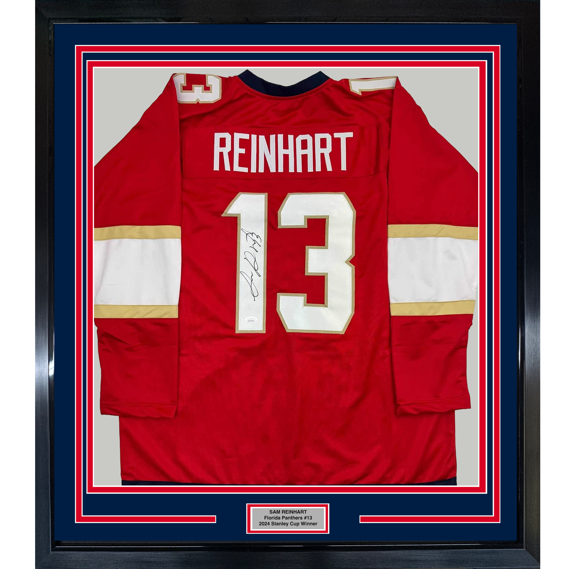 Red Florida Panthers hockey jersey number 13 with "REINHART" nameplate and autograph, framed with blue and red matting.