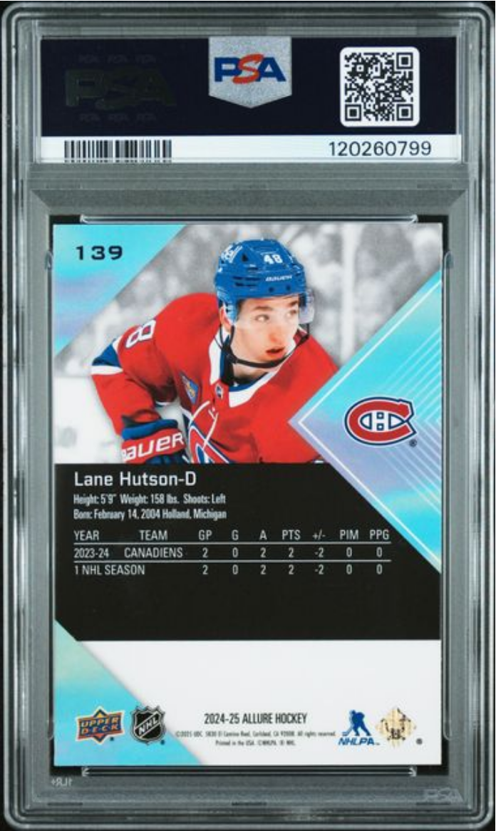 PSA-graded hockey card in clear plastic case showing Lane Hutson in red Montreal Canadiens jersey with blue helmet, front view.