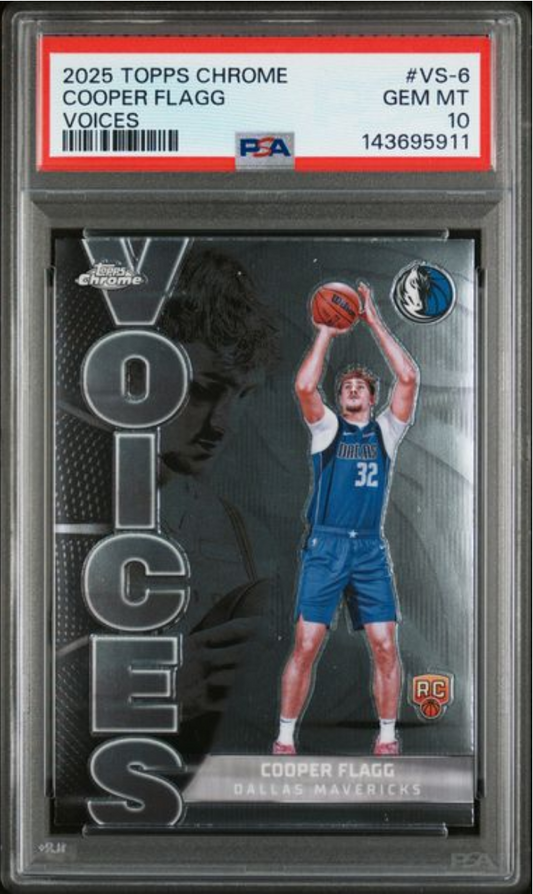 PSA-graded card in plastic case showing Cooper Flagg in Dallas Mavericks blue uniform shooting basketball, with red label and 10 Gem Mint rating visible.