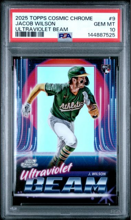 PSA-graded baseball card in plastic case showing Jacob Wilson in green Oakland Athletics uniform running, with pink and blue neon "Ultraviolet Beam" design and red label at top.