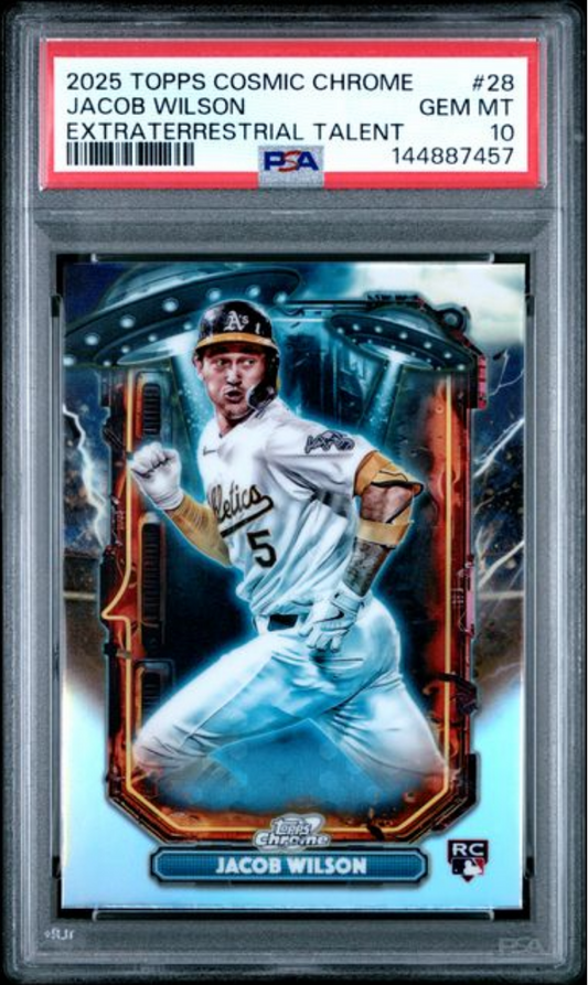 PSA-graded trading card in plastic slab displaying Jacob Wilson in Oakland Athletics uniform mid-swing with cosmic blue and red holographic design elements.