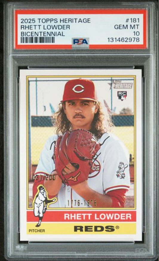 PSA-graded baseball card in plastic case showing Rhett Lowder in Cincinnati Reds uniform holding red glove against yellow background.