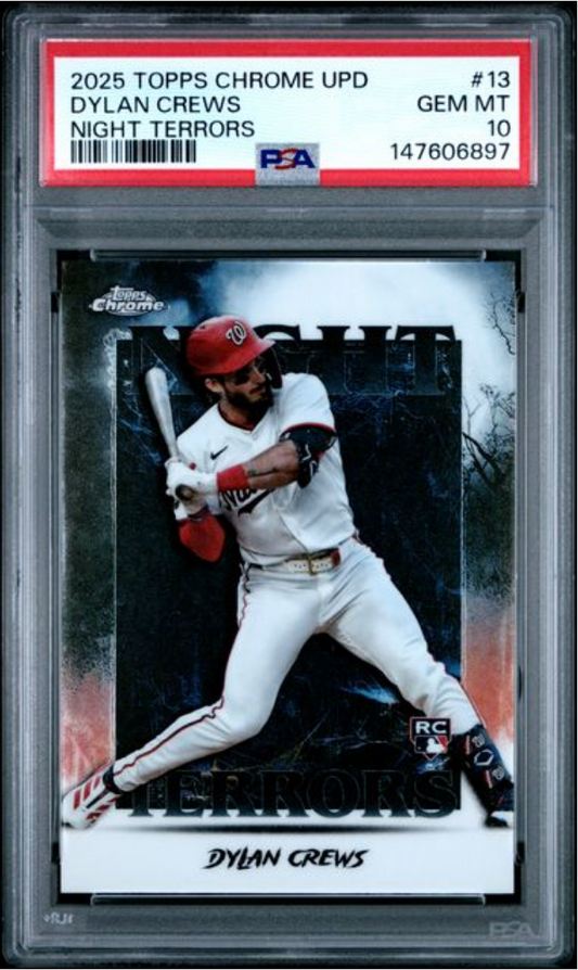 PSA graded baseball card in clear case showing Dylan Crews in red Nationals uniform batting stance against dark background.