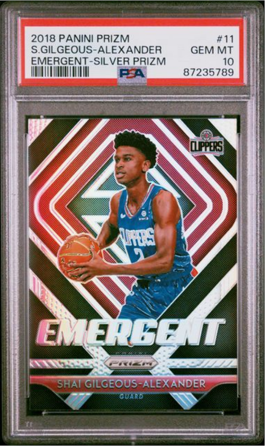 PSA-graded trading card in clear case displaying Shai Gilgeous-Alexander in Clippers uniform against geometric red and white background.