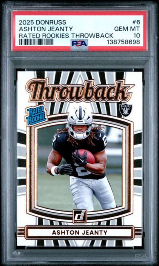 Front of graded PSA 10 trading card in clear case showing Ashton Jeanty in Raiders uniform holding football.