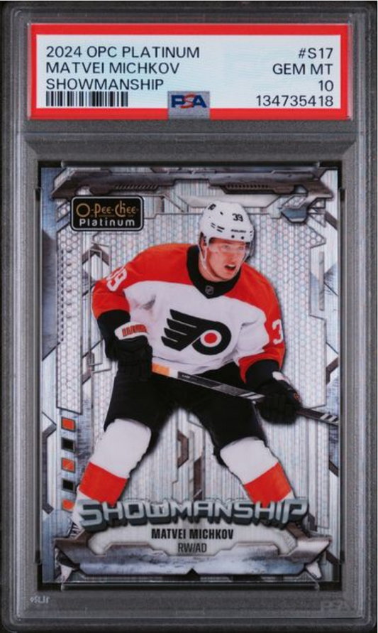PSA-graded hockey card in clear holder showing Matvei Michkov in Philadelphia Flyers uniform with red label indicating Gem Mint 10 rating.