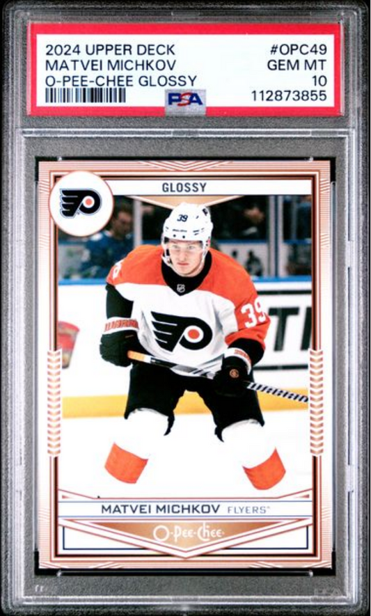 PSA-graded hockey card in clear plastic case displaying Matvei Michkov in Philadelphia Flyers uniform with white helmet and stick.