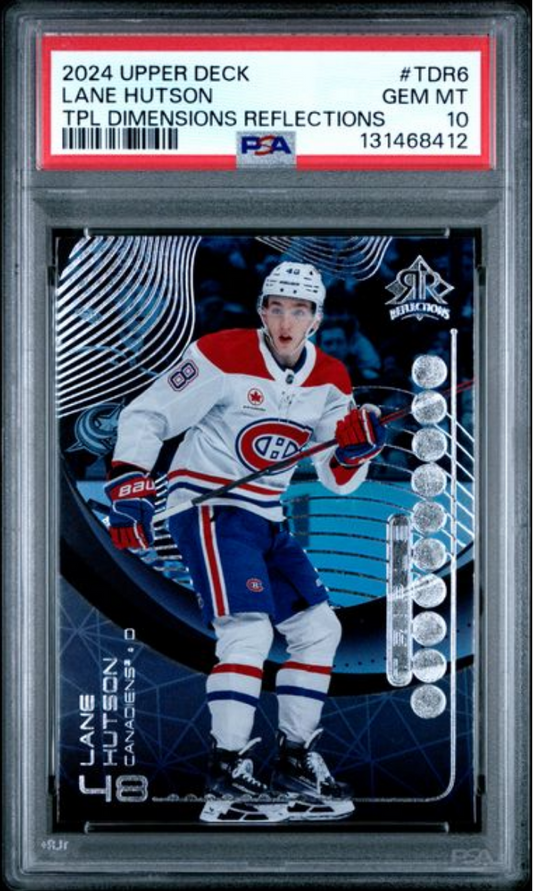 PSA-graded hockey card in clear plastic case showing Lane Hutson in Montreal Canadiens white jersey with blue and red stripes, number 48, against dark blue geometric background with silver circular design elements on right edge.