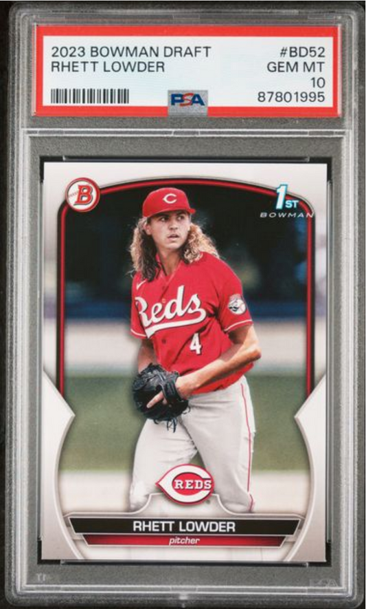 PSA-graded 2023 Bowman Draft Rhett Lowder baseball card in clear holder showing pitcher in red Cincinnati Reds uniform.