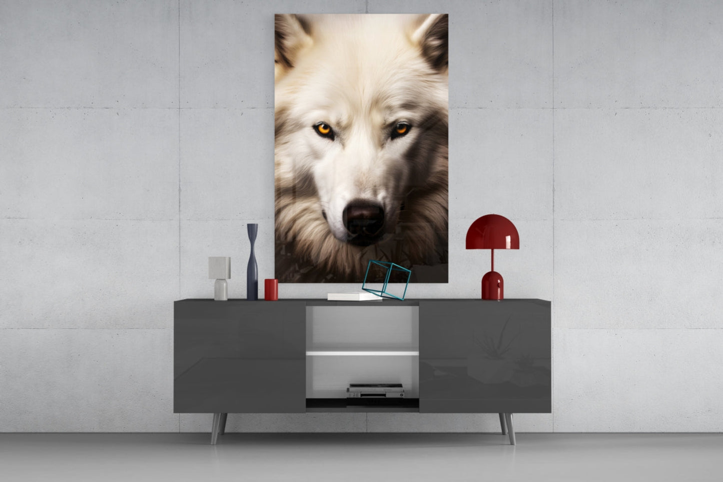 White wolf portrait with golden eyes displayed as vertical glass wall art above a dark gray media console in a modern interior setting.