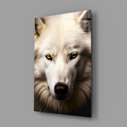 Close-up portrait of a white wolf with golden eyes and dark nose on glass wall art, mounted on gray wall.