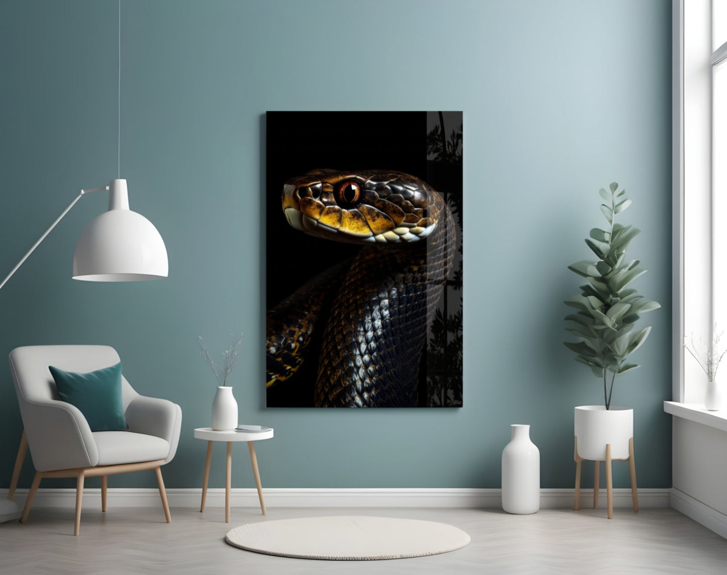 Golden-eyed black snake glass wall art displayed on a pale blue wall above a white chair and potted plant.