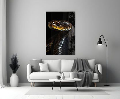 Golden-eyed black snake glass wall art displayed above white sofa in modern living room setting.