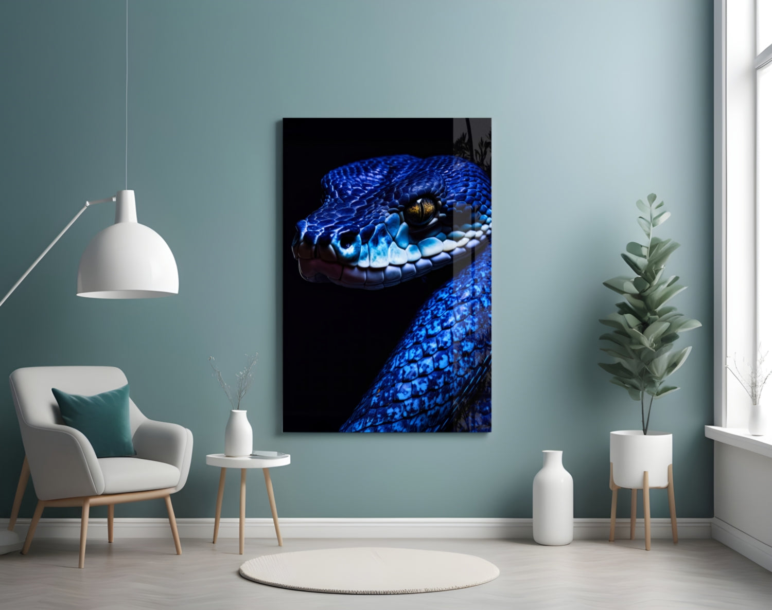 Blue viper glass wall art hanging in a modern living room with teal walls, white chair, and potted plants.