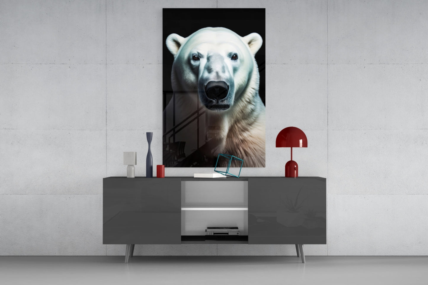 Polar bear portrait glass wall art displayed above gray console table with red lamp and decorative accessories in modern interior setting.