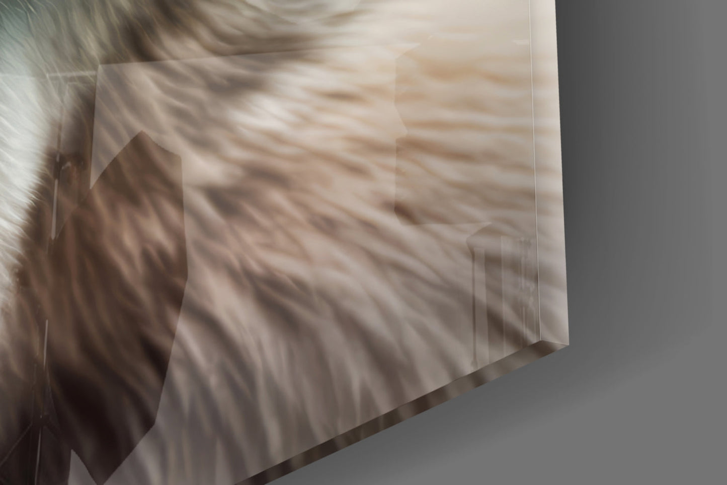 Close-up angled view of transparent glass wall art displaying a polar bear's face in brown and white tones against a gray background.