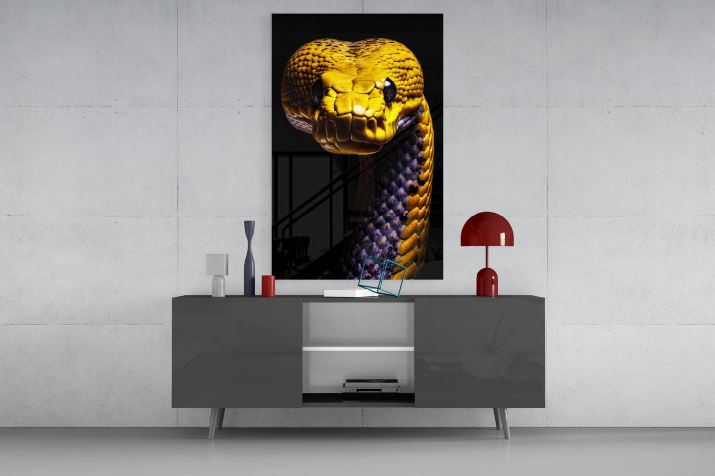 Golden and purple serpent head glass wall art mounted above gray sideboard with red lamp and decorative objects.