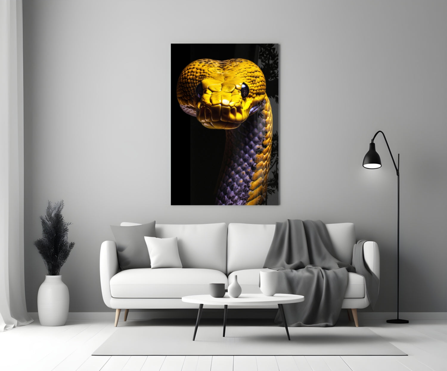 Golden-headed snake glass wall art displayed above a white sofa in a minimalist living room setting.