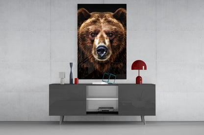 Portrait of a brown bear with blue eyes centered on a dark background, displayed as framed wall art above a gray media console.