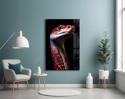 Glass wall art depicting a red and white serpent's head in profile against black background, mounted in modern room setting.
