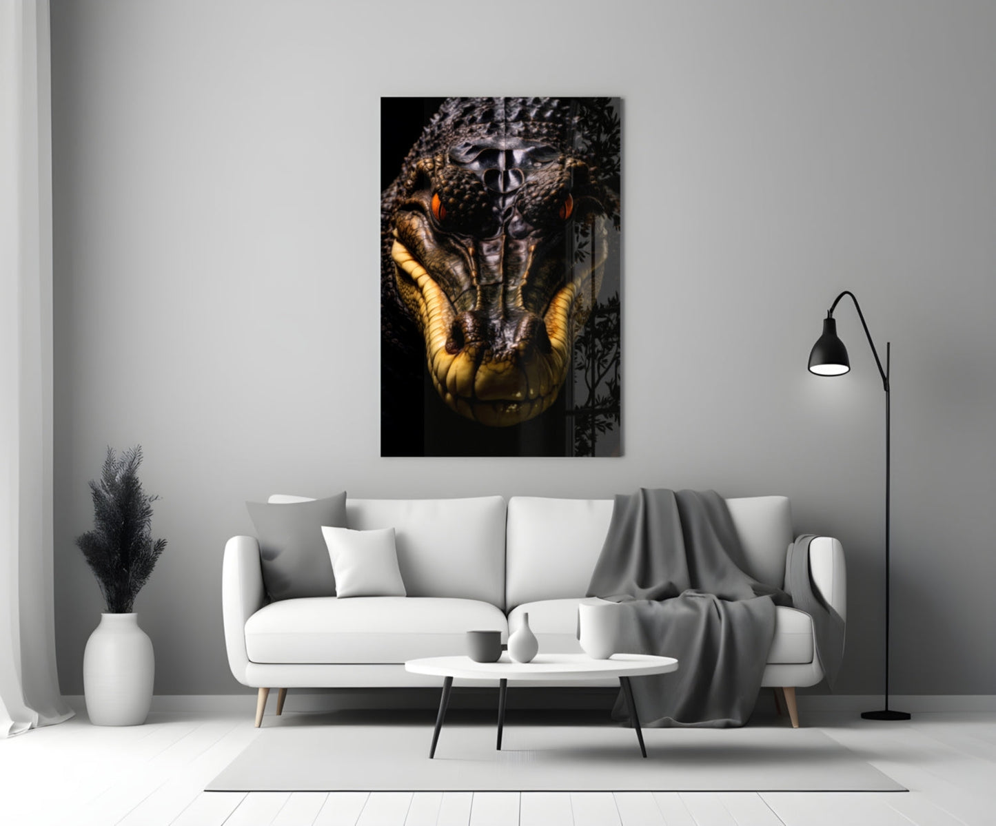 Glass wall art depicting a close-up crocodile head with golden-yellow lower jaw against dark background, displayed above white sofa in modern living room.