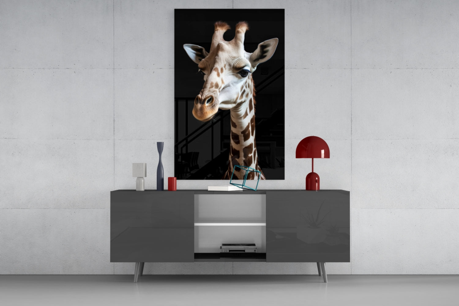 Light-colored giraffe portrait glass wall art displayed above a gray media console with red decorative lamp and accessories.