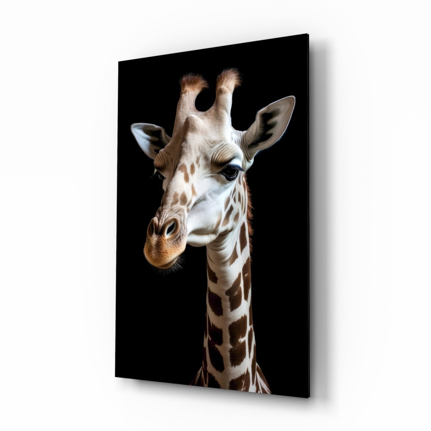 Light-colored giraffe with brown spots facing left against black background, displayed as angled glass wall art panel.