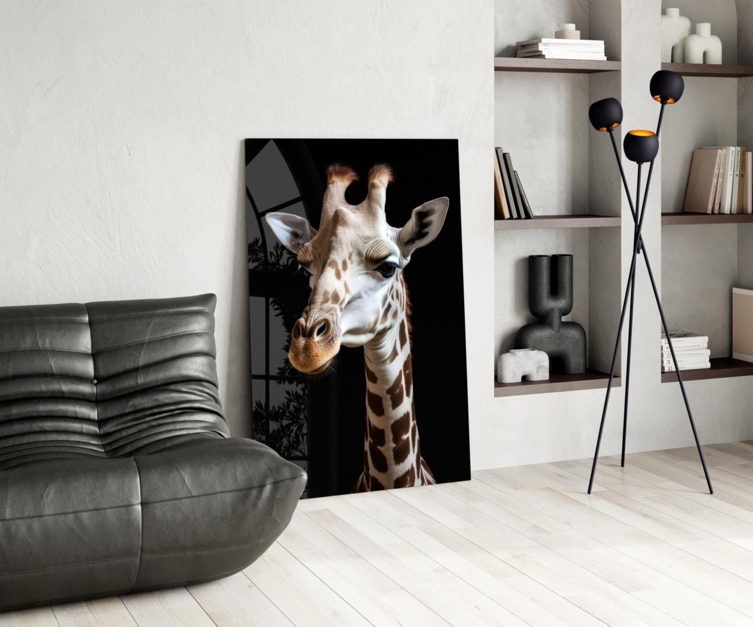 Giraffe portrait glass wall art with tan and white markings displayed in modern living room beside gray sofa and shelving.