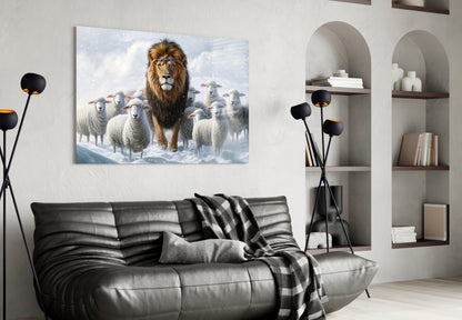 Glass wall art depicting a majestic lion surrounded by white sheep in a snowy landscape, displayed above a black leather sofa in a modern interior.
