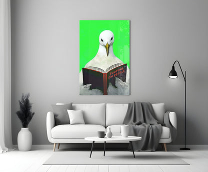 White seagull reading "Hooping on People" book against bright green background, displayed on living room wall above sofa.
