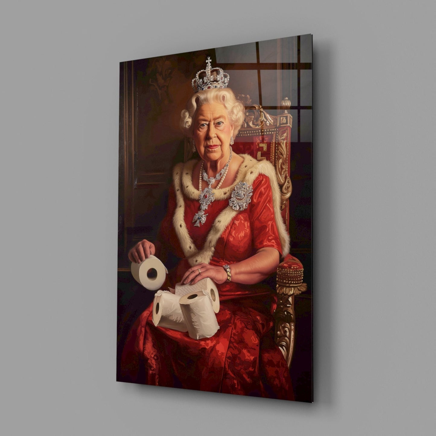 Angled view of glass wall art showing a figure in red royal regalia holding toilet paper rolls, mounted on gray background.