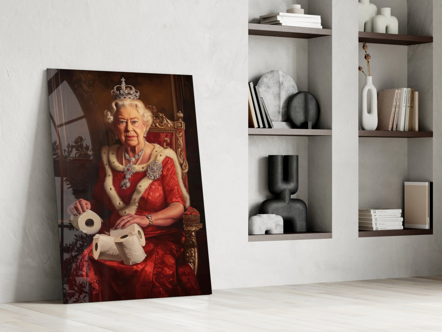 Glass wall art leaning against white wall beside shelving unit, showing regal figure in red dress holding toilet paper rolls.