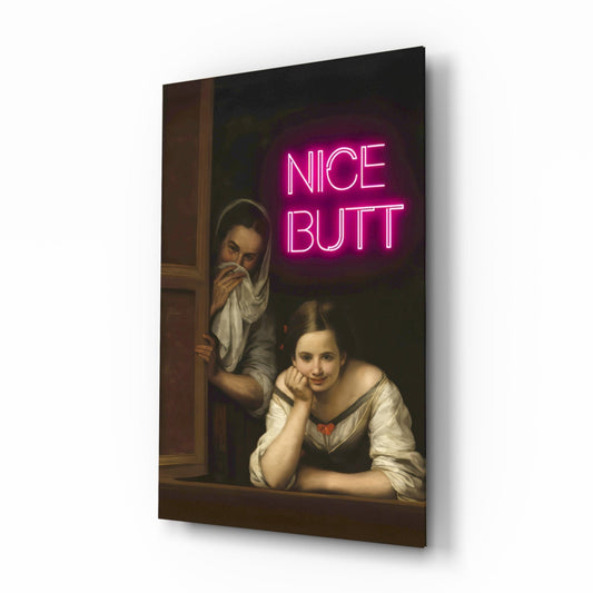 Angled view of glass wall art featuring two classical painted figures at a window with bright pink neon "NICE BUTT" text overlay.